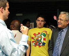 Davila listens while student talks
