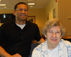 Image: Mrs. Joan Williams and Jandi Arboleda enjoy a moment at her 80th birthday party. 