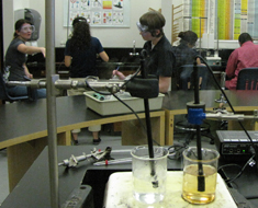 Image:  PASCO digital probes (in foreground) automatically measure temperature change