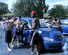Image: Members of the MSSD football team staged a car wash on September 11, 2010 to raise money for the team travel fund. Over $500 was raised. (Photo: Susan Flanigan)