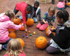 Image: KDES students working on pumpkins