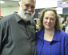 Image: Clerc Center interpreter Juniper Sussman poses with Chuck Baird, her uncle, at the reception held in the MSSD Star Gallery.