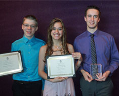 Image: Ernest “Chad” Willman (far right) poses with the Award for Excellence in the Arts that he received at the Kennedy Center on May 15. Pictured with Willman are MSSD Certificate of Merit winners Brennan Terhune-Cotter (left) and Kaori Vazquez.  (MSSD Certificate of Merit winner Chelsea Korn not pictured)
