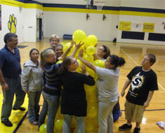 Image: KDES families enjoyed building a balloon tower at the Family Bonding Workshop held on October 11. (Photo: Kendall PTA Facebook)