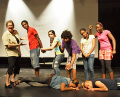 Image: Who done it? Dorothy Wynne poses with MSSD production crew of Robert Parcells, Claudia Giodano, Matthew Whitfield, Fatou Greene, Jessica Nortay, and the victims Pakia Taylor and Richard Navarro on the floor.