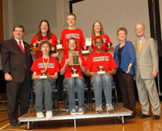 Image: President Hurwitz,  Academic Bowl coordinator Sherry Duhon, and provost Steven Weiner congratulate the MSSD on their Second Place win.