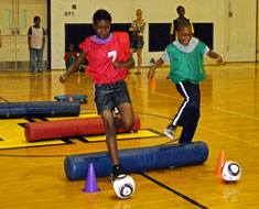Image: LaDasha Williams and Noah Richards compete in one of the ESY Olympic events. (Photo: Susan Flanigan)