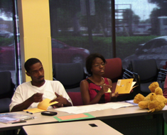 Image: Families meet once a week for six weeks. During the two-hour sessions, parents and caregivers learn how to read a new story and bring home a SRP book bag containing a storybook, a practice DVD with a deaf adult signing the story in ASL, a “Tips for Reading to Your Deaf Child” bookmark, and an activity guide with ideas related to the story.