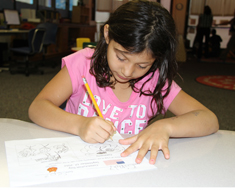 Image: Second graders made a comparison of community and classroom laws and rules. (Photo: Susan Flanigan)