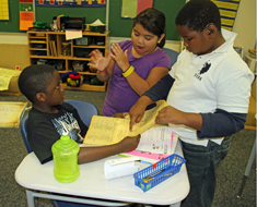Image: Fourth graders review a facsimile of the Constitution.
(Photo: Susan Flanigan)
