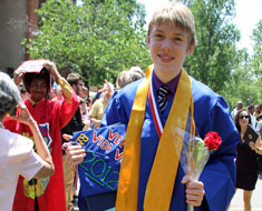 Image: Class valedictorian, Brennan Terhune-Cotter’s cap sported the Latin Veni, Vidi, Vici, “I came, I saw, I conquered.” (Photo: Susan Flanigan)