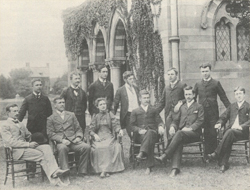 Agatha Tiegal Hanson is the sole woman of the class of 1893. She sits among the men in this picture, which is taken outside of Chapel Hall