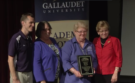 Kathy Vesey receiving her Academic Bowl Hall of Fame award from President Cordano in 2016