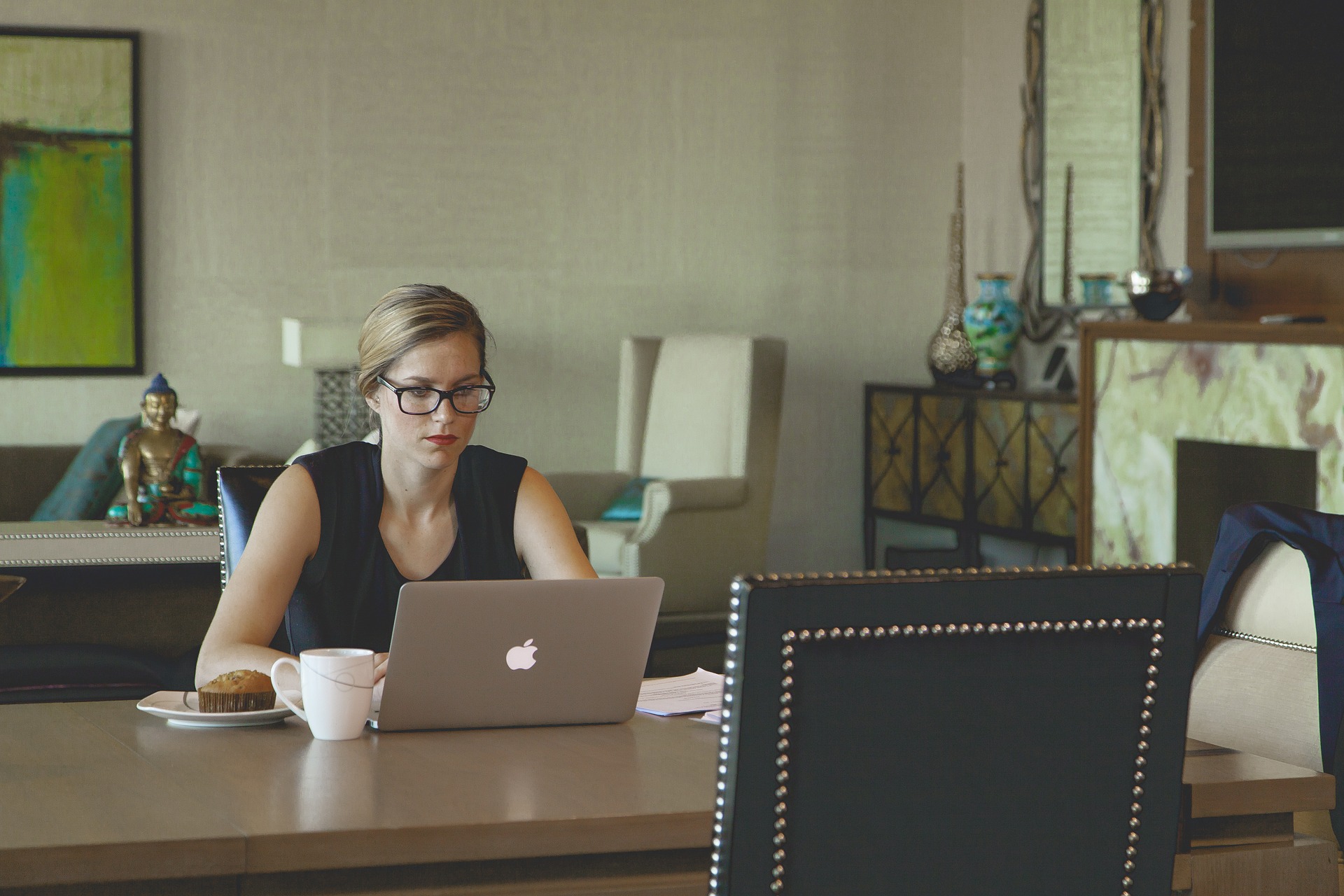 image of a woman at home on her laptop