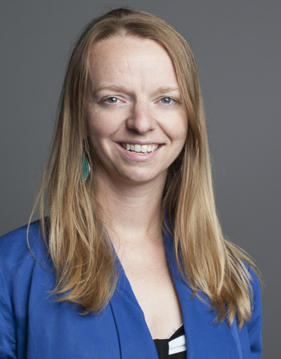 Hilary Mayhew_headshot Hilary Mayhew_headshot. White female, smiling in blue blazer.