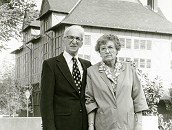 David Peikoff and his wife Pauline standing outside the Alumni House which now bears their name.