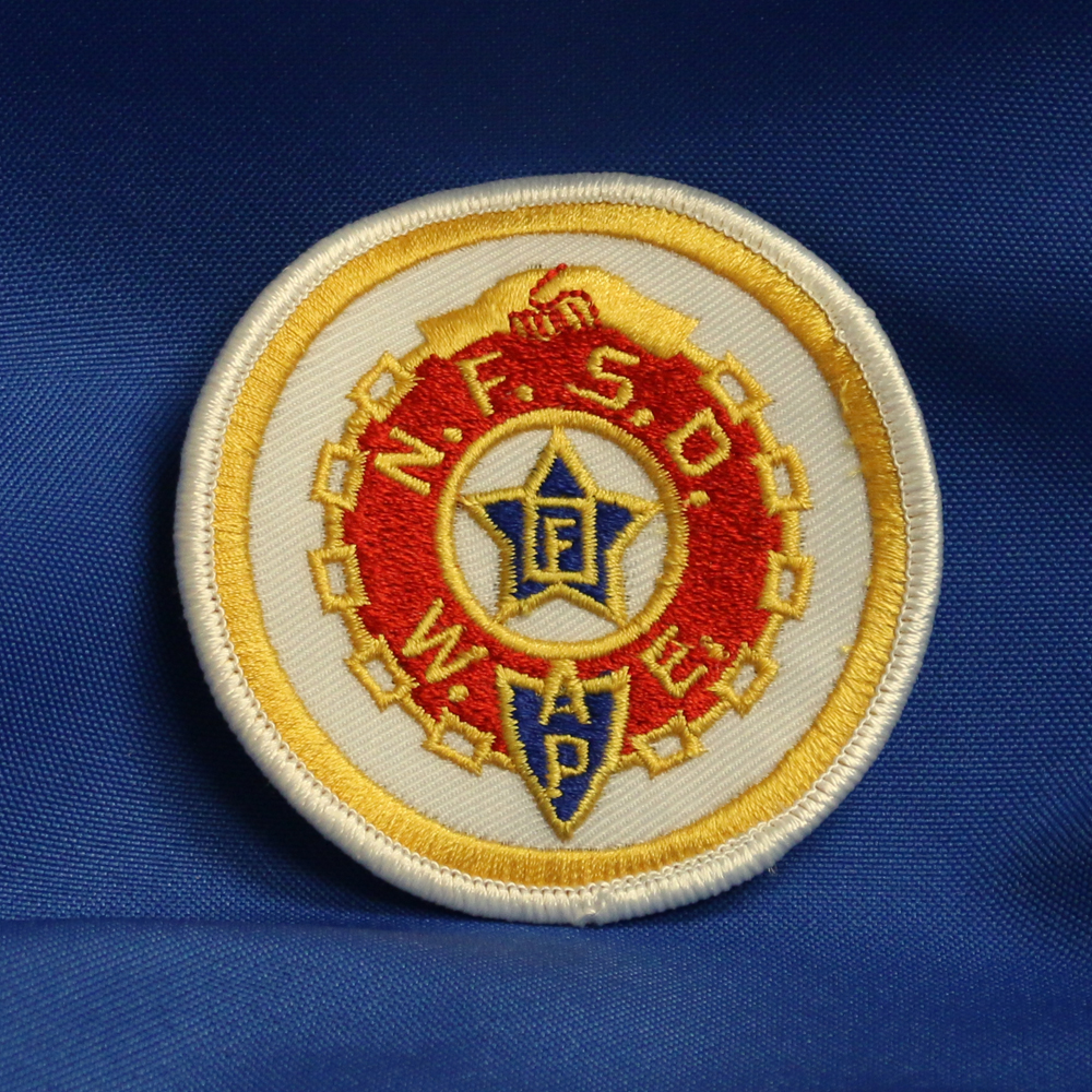 Embroidered badge of NFSD emblem.