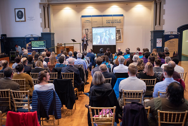 A full house is shown.