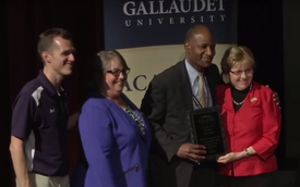 Bernie Palmer receiving his Academic Bowl Hall of Fame award from President Cordano in 2016